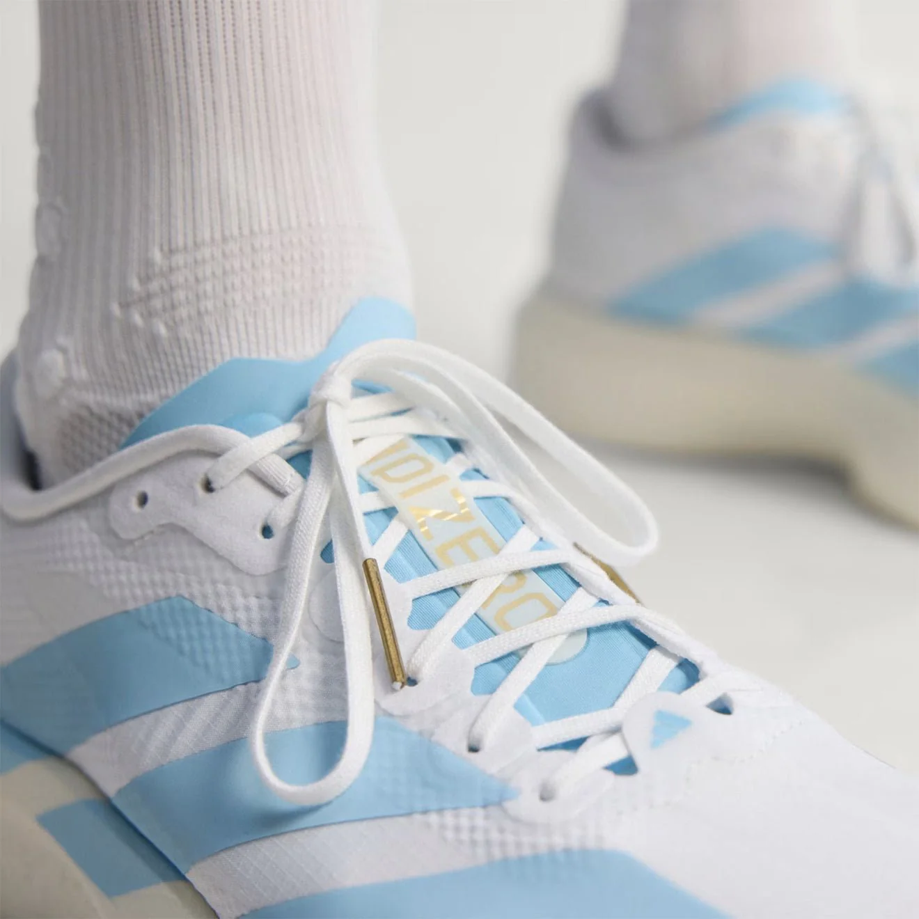Adidas Adizero Evo SL Woven Trainer Cloud White / Clear Blue / Matte Gold - Image 7